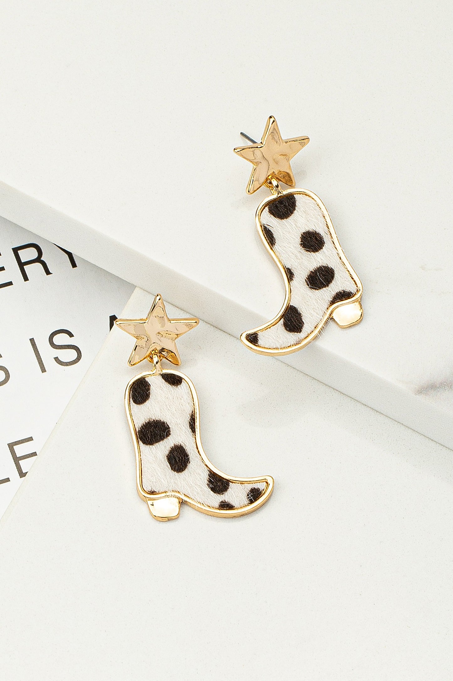 Star and boot drop earrings with leopard leather