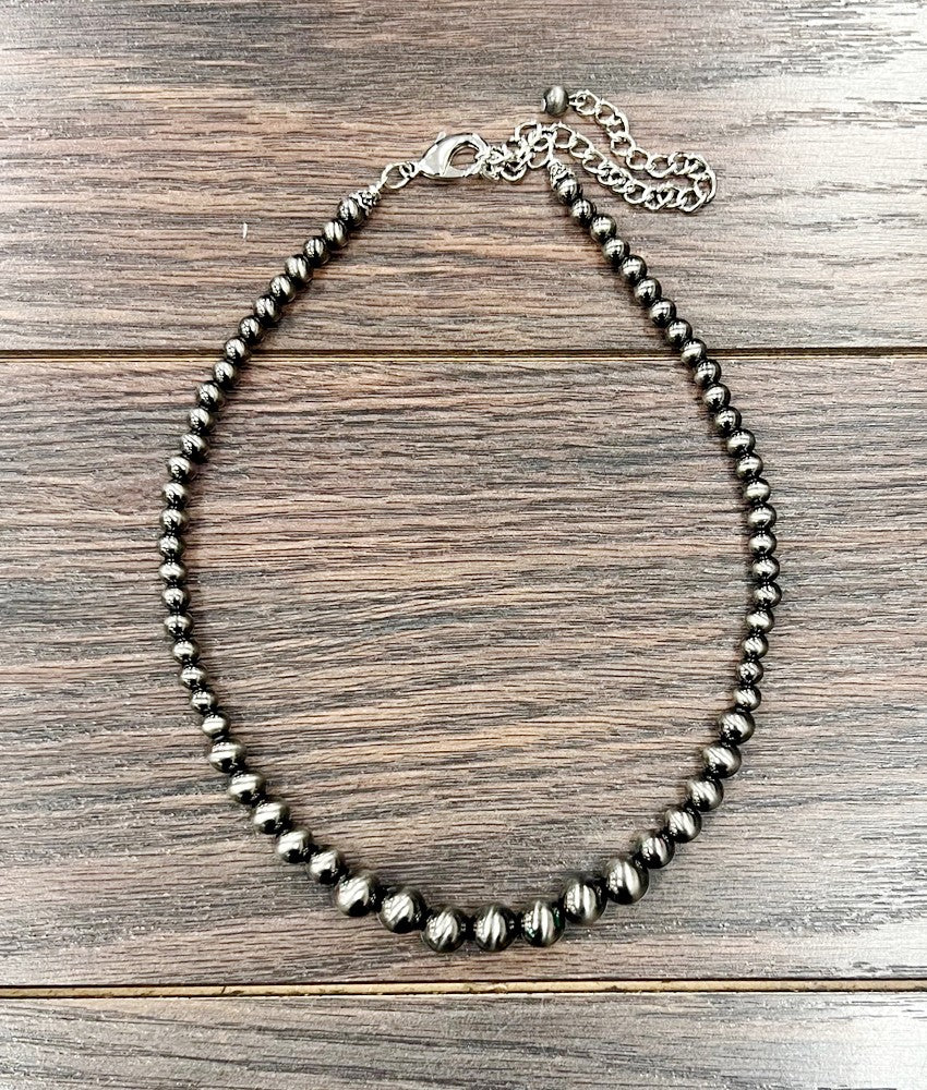 16" Long, Graduated Polished Pearl Necklace 738022