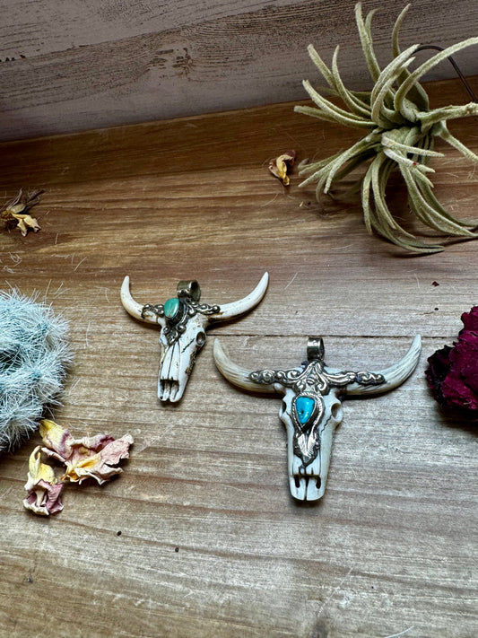 Antler longhorn with turquoise pendant