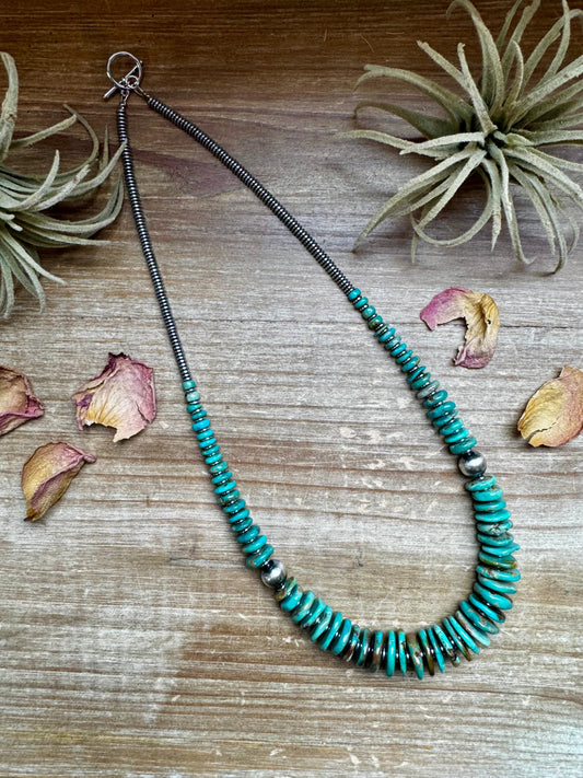 22 inch Graduated Green necklace with Sterling silver pearls
